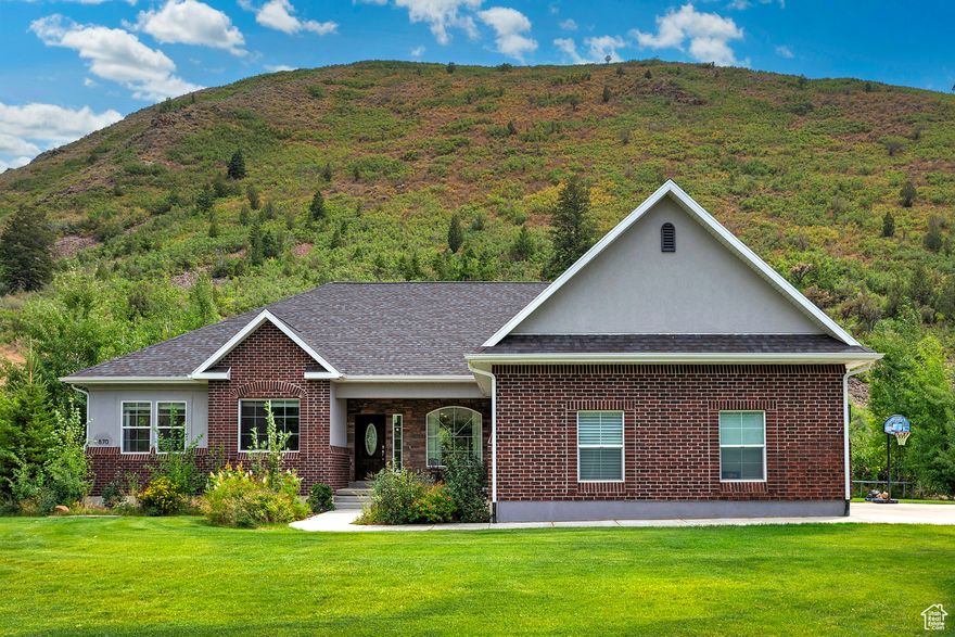Discover this exceptional rambler in Beavercreek, set on 0.92-acre homesite with sweeping, unobstructed mountain views and no rear neighbors for outstanding privacy. Built in 2015 and offering nearly 5,000 square feet, the home blends easy single-level living with generous gathering spaces and flexible rooms to fit your lifestyle. An inviting open and flowing floor plan and a spacious kitchen are ideal for everyday living and entertaining, with abundant natural light framing the mountain backdrop. With six bedrooms and five bathrooms, there's ample space for guests and options for a home office, fitness area, or media room. A large three-car garage plus dedicated RV parking provides plenty of room for vehicles, gear, and toys. The expansive lot invites outdoor living, gardening, and play under wide-open skies. Enjoy a peaceful Kamas setting close to trails, rivers, and lakes, with a short drive to Park City dining, shopping, and world-class resorts. Opportunities like this are rare-see it today.