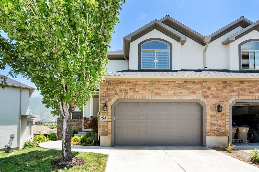 Beautiful townhome located in a quiet cul-de-sac, this townhome offers low maintenance. Enjoy east-facing 180 degree views of the mountains and valley from the back deck. Owner has put in a private trail from home to 150 miles of groomed trails for dog walking, hiking, and mountain biking. Main level features a bright, open floor plan with vaulted ceilings, a spacious kitchen, family room, laundry room, and office. The kitchen is complete with tile backsplash, granite countertops, walk-in pantry, and recessed lighting. Upstairs you'll find the primary bedroom with vaulted ceilings and an ensuite featuring separate shower and oversized soaker tub, two sink vanity, bathroom, and large walk-in closet, plus two additional large bedrooms with mountain views. Fully finished walkout basement includes another bedroom, bathroom, family room, and kitchenette. Perfect for older kids wanting their own privacy. Home boasts new roof, brand new furnaces, a/c's and hot water heater. Two car garage with epoxy floors, extra storage, and utility sink. Conveniently located near multiple hiking, biking, and walking trails. Easy freeway access and close to shopping, entertainment, and dining options.