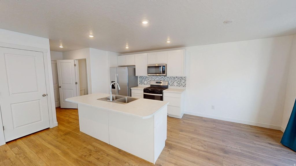 Photo of 1917 N BLUE IRIS AVE E #1090, Tooele, UT 84074 (MLS # 2140402)