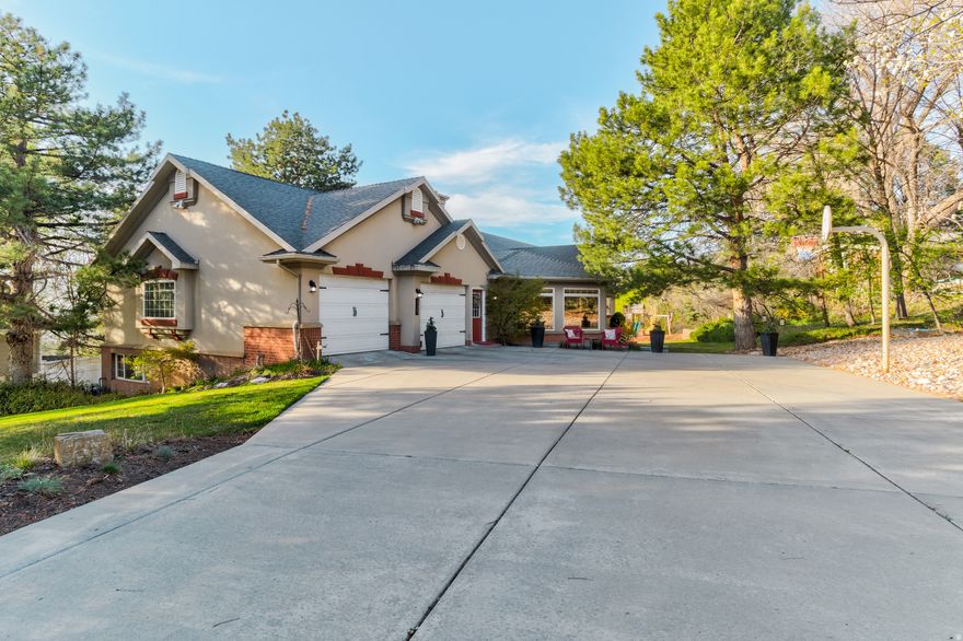 Welcome to a home designed for gathering, entertaining, and everyday comfort. Located on the desirable east bench of Bountiful... Step inside to an open and inviting living space that flows seamlessly into a spacious dining area-perfect for hosting everything from family dinners to larger gatherings. Just off the main living area, French doors lead to a dedicated office, offering a great work-from-home setup with privacy when you need it. The kitchen is built to impress, featuring a large center island, double ovens, a five-burner gas range, and abundant cabinet space-ideal for both daily living and entertaining. The main level includes a primary suite, a guest bedroom, and convenient access to a half bath off the garage. Upstairs, the guest bathroom offers a double vanity, making busy mornings easier. This home offers multiple living spaces and warmth throughout, with three fireplaces, including a cozy wood-burning stove in the expansive downstairs den. The fully finished walkout basement adds incredible flexibility with a second kitchen and separate living space, making it ideal for multi-generational living, long-term guests, or potential rental use. The lower level also includes an additional primary suite, two more bedrooms, and flexible space that could easily be used as a craft room, office, or hobby area. Step outside to a large, flat 0.40-acre lot with mature landscaping and room to relax, play, or entertain. The property also offers beautiful views of Utah Lake, creating a peaceful and scenic backdrop. A rare highlight of the home is the private indoor swimming pool, allowing for year-round enjoyment and a truly unique lifestyle feature. With multiple access points, generous storage throughout, and a versatile layout, this home offers a combination of space, function, and flexibility that is hard to find. Square footage figures are provided as a courtesy estimate only and were obtained from county records. Buyer is advised to obtain an independent measurement.