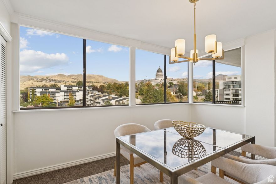 ***SIGNIFICANT PRICE REDUCTION TO 350,000!*** Enjoy direct Utah State Capitol views from this bright 8th-floor Zion Summit condo featuring one bedroom, two bathrooms, and expansive windows showcasing mountain and skyline views. Open living and dining spaces lead to a private balcony perfect for relaxing at sunrise or sunset. Recent updates include new paint, freshly cleaned carpets, resurfaced bathtub, updated lighting, and a new refrigerator. Several items from the building assessment have begun, providing added future value. Assessment has been paid by seller. The oversized primary suite includes a walk-in closet, fireplace, and two full bathrooms. Laundry is conveniently located just down the hall. Secure building with covered parking, pool, fitness room, community lounge, and on-site management. HOA covers nearly everything except electricity and internet. Prime access to Memory Grove Park, City Creek Canyon, the State Capitol, Main Street, Trax, and downtown amenities. Schedule your showing today!  Square footage figures are provided as a courtesy estimate only and were obtained from county records. Buyer is advised to obtain an independent measurement.