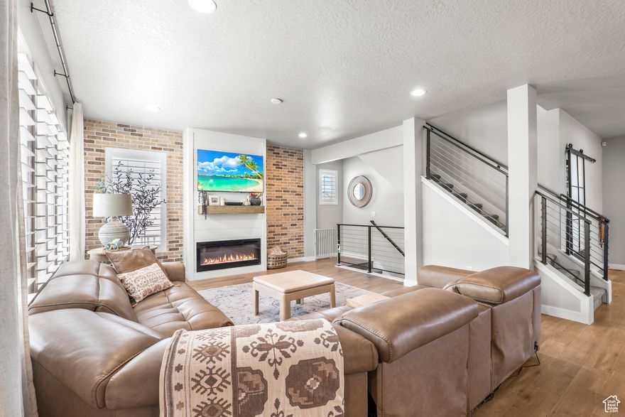 Why wait for a New Build when you can move into a quiet, established neighborhood NOW.  Walking distance to the new Cove House, Watercourse, and Daybreak's largest park (Highland Park). An entertainer's dream with a spacious, easy-to-navigate main floor and an incredible backyard featuring a large patio under a massive 20'x20' pergola surrounded by mature trees. Interior highlights include plantation shutters, an open floor plan, office with built-ins and a metal sliding door, and a spacious mudroom. Rare four-bedroom layout upstairs with custom closet organization. The modern kitchen features custom cabinetry, pull-out drawers, custom pull-outs in the pantry for convenient storage and optimal space, and upper and under cabinet lighting. The finished basement offers two living areas, a built-in dry bar, LVP flooring, and additional storage. The extended-depth two-car garage provides space for long-bed trucks or extra gear. Classic architecture, modern function, and exceptional outdoor living come together in this rare Daybreak find. Owner/Agent.