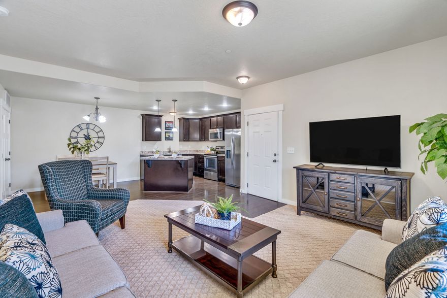 Experience refined main level living in this beautifully cared for 3 bedroom, 2 bath condo.-perfectly situated for comfort and convenience. Enjoy the ease of single level living with no stairs, plus your own dedicated parking spot reserved exclusively for this unit. Step inside to an inviting, open layout filled with natural light. Large windows showcase amazing mountain views, creating a serene backdrop for everyday living. The kitchen, dining, and living areas flow seamlessly-ideal for both relaxing and entertaining. Located in a highly convenient area, you'll appreciate quick access to the interstate, making commuting simple. You're also just minutes from Centerville Plaza, offering shopping, restaurants, and daily essentials-all right at your fingertips. Whether you're downsizing, investing, or looking for a comfortable place to call home, this condo delivers unbeatable value and convenience.