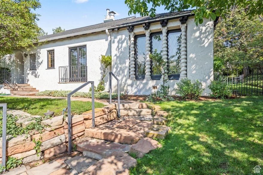 Imagine living in a prime urban neighborhood on a secluded  acre lot- with a 10-minute walk to the University and easy access to downtown. This one-of-a-kind Spanish Revival home, designed and built in 1922 by renowned architect and bird lover Alberto Treganza, seamlessly blends architectural integrity with thoughtful renovations and preservation. Enjoyed and cared for by the same owner for the last  37 years, the home radiates character and charm. Original details include stunning leaded-glass windows, a graceful barreled ceiling, fireplace, and arched doorways. Sunlight fills the rooms, highlighting both the home's historic craftsmanship and your personal art collection. An airy sunroom invites relaxation year-round. Outdoors, stone walkways lead to a private patio, shaded lawn, and lush gardens complete with a waterfall, blooming lilies, and swimming koi. Mature trees and natural landscaping create a tranquil retreat-perfect for both moments of solitude and lively gatherings of family and friends. This is more than a home; it's a timeless sanctuary where history, beauty, and modern living come together. ~All Information to be verified by buyer and buyer's agent~