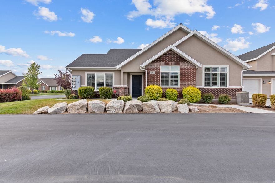 Charming main-level cottage-style townhome in a sought-after 55+ Lehi community (with up to 20% under 55 allowed)! This spacious 2 bed, 2 bath home offers easy living with full wheelchair accessibility, including wide hallways, walk-in showers, and grab bars in the guest bathroom. Enjoy the convenience of no stairs, an open layout, and a welcoming neighborhood with tons of community activities for active adults. Thoughtfully designed and move-in ready-this one won't last!