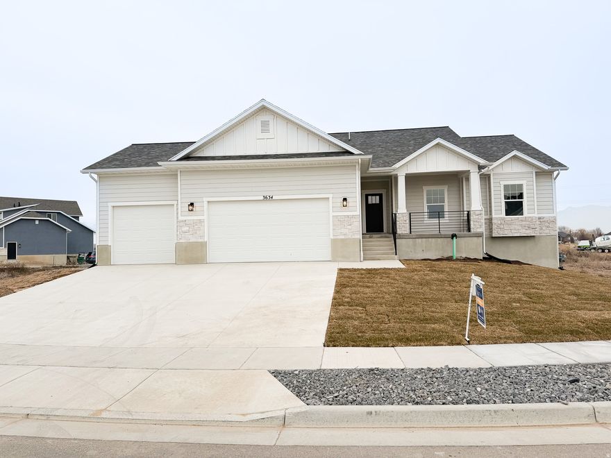 Drive down the highly desirable street of the NEW Macy Lane development and come see our Remington plan here on lot #6! This charming rambler style plan has all you need for single level living, plus an incredible unfinished basement set up if you desire more livable space! As you enter the home, you are greeted with a welcoming open-concept family room and kitchen set up as well as a polished off set of stairs leading to the downstairs basement with modern black metal railings. The family room is plenty of space to gather and enjoy your new space while the kitchen is only steps away. With soft closing cabinetry, quartz counters with upgraded 2 inch slabs, tasteful subway title backsplash and plenty of storage, this kitchen has it all! Off of the kitchen is more storage space with a pantry and coat closet and door leading out to your oversized 3-car garage. On the other wing of the main level of the home you will find the beautiful primary bedroom and on-suite bathroom with both a separate tub + shower, double sink vanity and private toilet room. Attached to the bathroom is a spacious walk-in closet. Down the hallway you will find two more bedrooms with custom built closets and another full sized guest bathroom.   A highlight of this home is the additional basement space that can easily be finished off and used as a fully functioning rental unit as we have already built it out with a private exterior basement entrance if buyer desires passive rental income on the home. OR if you simply want more livable space to your home we can easily finish the basement off for you that way as well. Please call agent if you are interested in cost estimations for the finished basement.  *Exterior concrete soon to be poured and home expected to be finished mid September. Partial front landscaping coming soon!!  *Opportunity for a buyer's concession incentive, please call for details  Link to full video tour of home:  https://vimeo.com/1105310196?share=copy#t=2.49