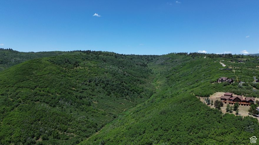PRICE REDUCED! 40 acres located in Silver Summit, Summit County, Utah. Summit County reports parcel SS-154-G is a grandfathered parcel upon which one home could be built. Zoned Ag-80 - 80-acre min lot size (cannot be subdivided further). Beautiful views of Park City, surrounding mountains, and ski resorts. Elevation ranges from 7,100 to 7,500 feet. 2024 Taxes: $4,564.30 (Summit County parcel: SS-154-G). Located near Jeremy Ranch, Glenwild, and Kimball Junction. 12 miles to Park City, 32 miles East of Salt Lake City, Utah. Within 30-minute drive of Deer Creek Reservoir, Jordanelle Reservoir, Rockport Reservoir, and Echo Reservoir.