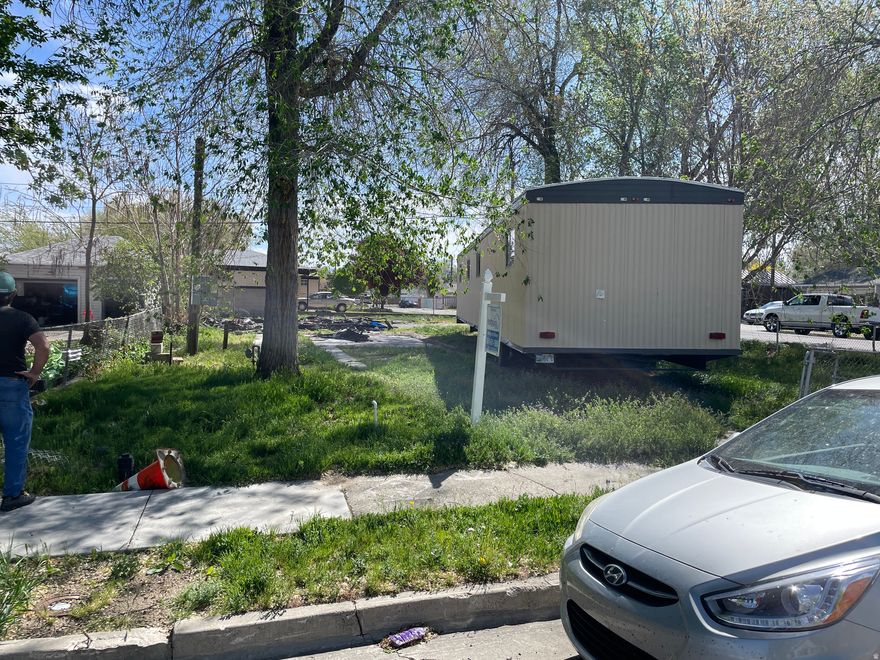 Lot is zoned for duplex, old manufactured home had fire in 2025 and was removed from property. Sewer, water, gas and power all connected to lot. No expensive hook up fees.