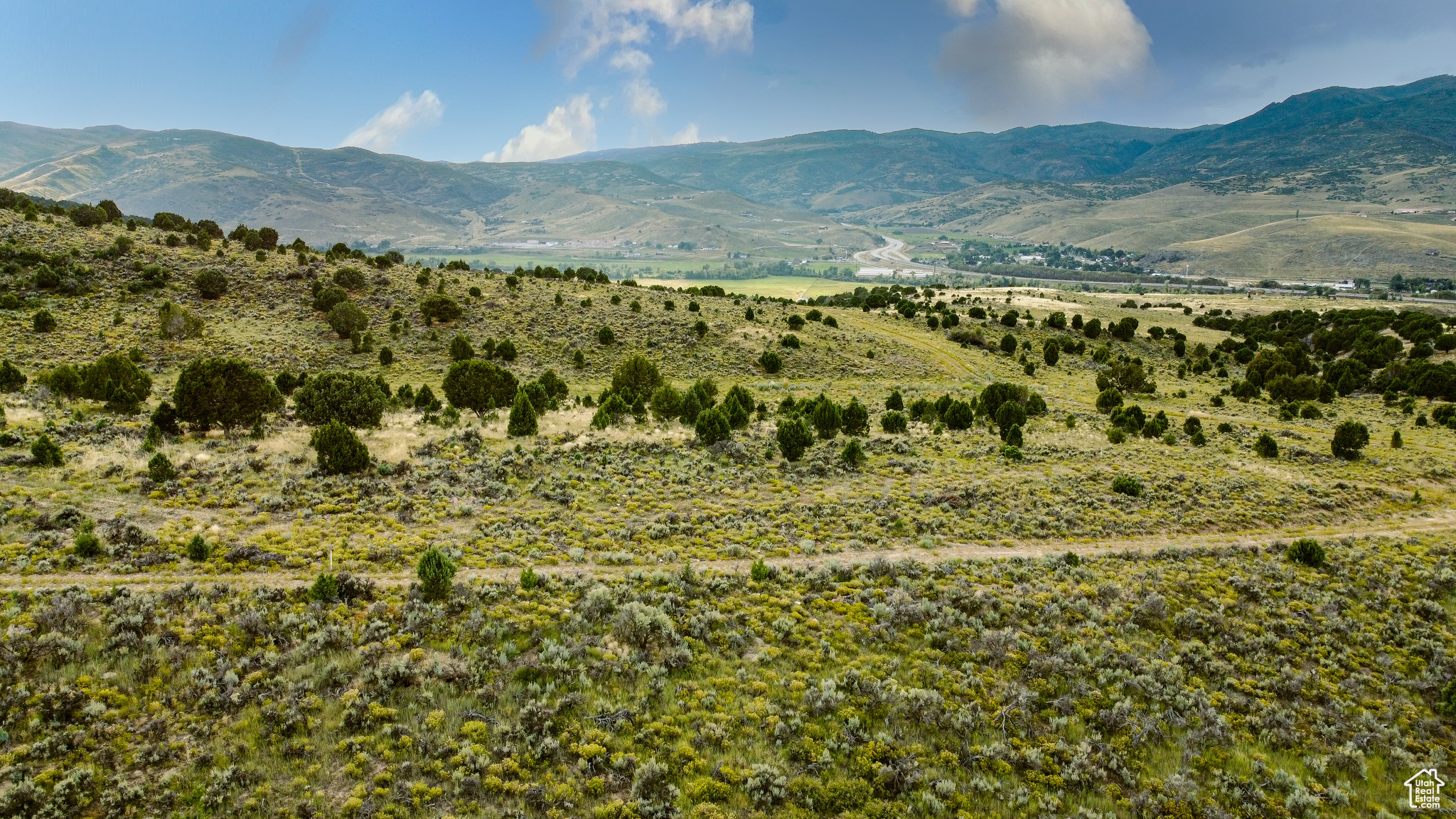 Discover Cherry Ridge - an exclusive enclave of 30 homesites nestled in the quiet hills of Cherry Canyon, just 20 minutes from downtown Park City and minutes from Promontory and Blue Sky Resort. This serene retreat features spacious 15 acre parcels with sweeping mountain and valley views. Residents enjoy underground utilities, high-speed fiber internet, paved roads, and private trails - all with no mandatory club memberships. Situated on a premier 1.65-acre lot, this homesite offers privacy and views within Cherry Ridge.