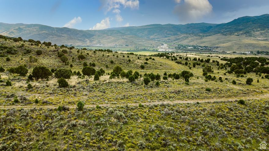 Discover Cherry Ridge - an exclusive enclave of 30 homesites nestled in the quiet hills of Cherry Canyon, just 20 minutes from downtown Park City and minutes from Promontory and Blue Sky Resort. This serene retreat features spacious 15 acre parcels with sweeping mountain and valley views. Residents enjoy underground utilities, high-speed fiber internet, paved roads, and private trails - all with no mandatory club memberships. Situated on a premier 1.65-acre lot, this homesite offers privacy and views within Cherry Ridge.