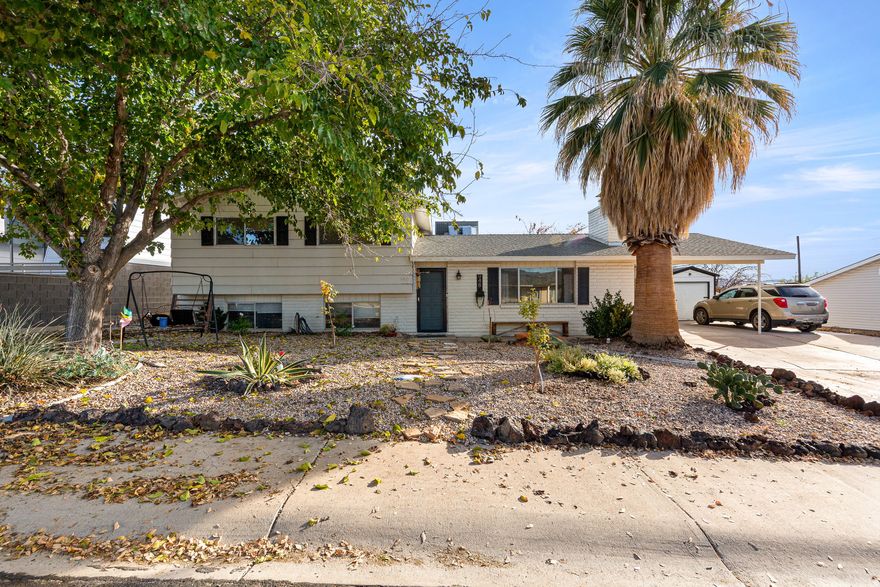 Amazing value on this beautiful tri-level single-family home! Stunning curb appeal and gorgeous trim work throughout. Step inside to an open kitchen featuring granite countertops added in 2018, plus durable new LVT flooring in the lower-level rooms. The expansive, fully-fenced backyard is the real showstopper: covered RV parking, dog run, chicken coop, garden area, in-ground trampoline pit, a brand-new storage shed, and-built just last year-an impressive 30'  30' insulated detached workshop/garage with a 10'  10' roll-up door. It's perfect for projects, equipment, or additional vehicles and delivers utility and storage most homes can only dream of. All this at a fantastic starter-home price and only needing a little TLC to truly shine-move fast, because this one won't last long!