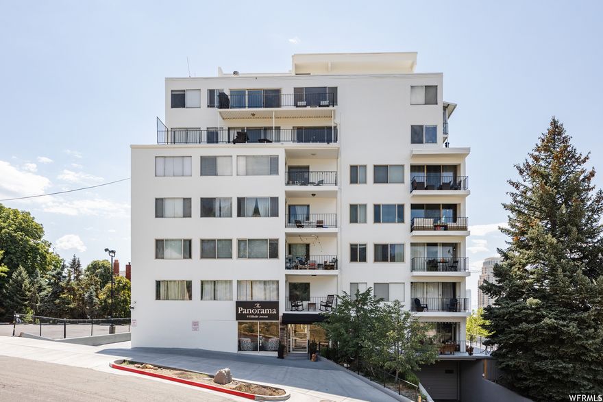 Offered for sale for the 2026 market, this penthouse condo in Capitol Hill presents a rare opportunity to acquire the only unit on the top floor. With zero shared walls and no noise from neighbors, this residence offers the distinct privacy of a "single-family home in the sky." Built in 1961 and held by the current owners since 2022, the space is flooded with natural light and retains an open flow. While clean and livable today, the unit is perfectly primed for light remodeling to bring out its full potential and maximize your investment.  The kitchen is currently open and features an oversized island ready to handle prep for dinners, drinks, and gatherings of all sizes, though a modern refresh could easily transform it into a showstopper. The spacious main suite is designed to be a true end-of-day sanctuary. However, the crown jewels of this property are the two private decks. The first wraps around the south and west, capturing incredible SLC sunsets and the downtown skyline in all its glory. The second, east-facing deck offers a quiet perch for morning coffee, Capitol views, and watching the seasons change along the Bonneville shoreline.  With secure, lockable elevator access directly to the unit and an unbeatable location near downtown's restaurants, theaters, and nightlife, this penthouse is the ultimate urban retreat waiting for your vision. Square footage figures are provided as a courtesy estimate only. Buyer is advised to obtain an independent measurement.