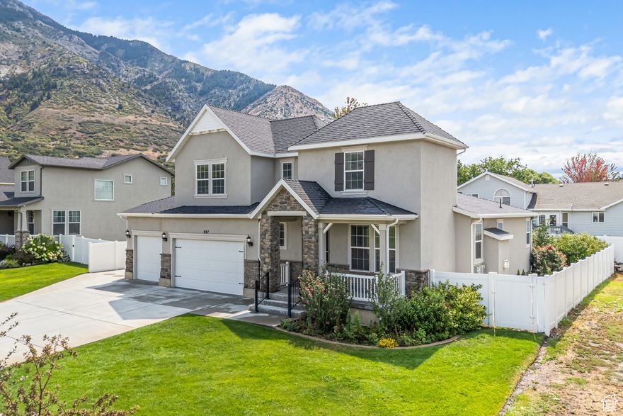 Built in 2018, this gorgeous home in North Ogden is the complete property. First, appreciate the stunning, panoramic mountain view from the front porch. Ben Lomond -- the mountain that inspired the Paramount logo -- towers to the north, majestic and sublime. The home is located in a quiet, established neighborhood dotted with similarly beautiful homes as nearly everyone, like this property itself, has full, professional landscaping -- not the unfinished mud pits of new construction developments! The three car garage is exactly what you've been looking for, and the serene, green, private, and fully-fenced backyard is the perfect oasis. The solar panels are a nice bonus as well. The inside continues the dream. The front corner office was brilliantly located with views of Ben Lomond; and the open-concept kitchen features granite countertops, stainless steel appliances, and professional cabinetry. The primary bedroom is conveniently located on the main floor and offers a gorgeous en suite bathroom and massive walk-in closet. Unlike many other homes for sale in the area, the basement is mostly finished, with newer carpet, paint, an additional half bath, and billiard lounge. Pool table included! This turnkey home beats the competition where it matters most -- location, views, and substantial, expensive improvements such as landscaping, vinyl fence, solar panels, and finished basement. This is the home you've been waiting for! Open house Saturday August 30th.