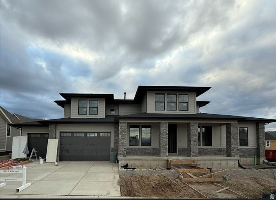 Lot 141 in Beacon Pointe by Symphony Homes - Estimated Completion: December 2025. The Browning XL plan blends luxury with thoughtful design. The main floor features both a flex room and a formal living room, each with custom millwork, plus a grand great room with two-story beamed ceilings. The gourmet kitchen offers ZLINE appliances, a spacious butler pantry, and a bright dining nook that opens to the covered patio. A custom mudroom bench and a large laundry room add everyday convenience. The expansive primary suite includes a custom closet butler system and oversized walk-in. Upstairs offers two bedrooms, a full bath, a bonus room, and an open-to-below loft. The fully finished basement is built for entertaining with two additional bedrooms, a home gym, media room, wet bar, huge game room, 9' foundation walls, an active radon system, and a cold cellar.  A must-see!