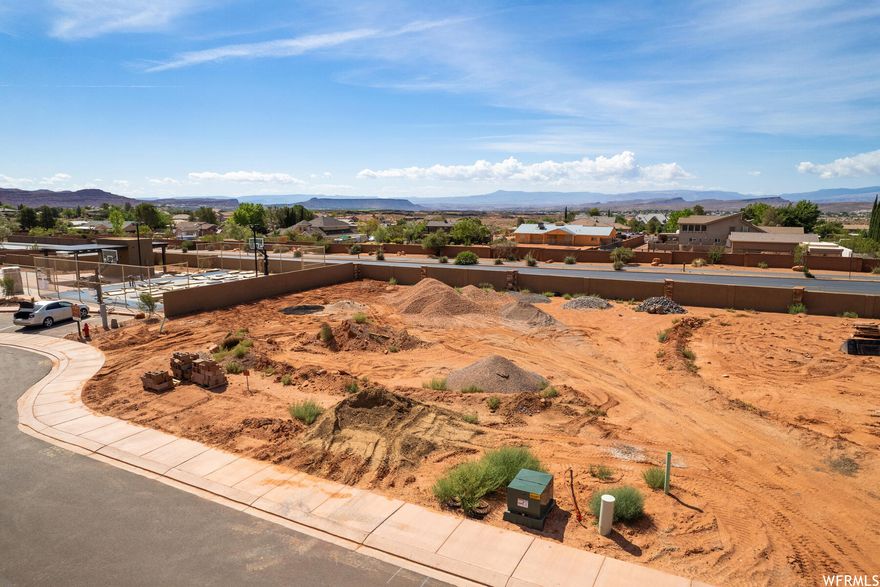 Newly released, north facing home lot at The Palisades at Snow Canyon. This master-planned gated community offers beautiful homes at the foot of Red Mountain and Snow Canyon State Park. Enjoy private homeowner amenities, including clubhouse, sport courts, pools, walking trails, and more. Choose among one of the Palisades Approved Builders and build your dream home.