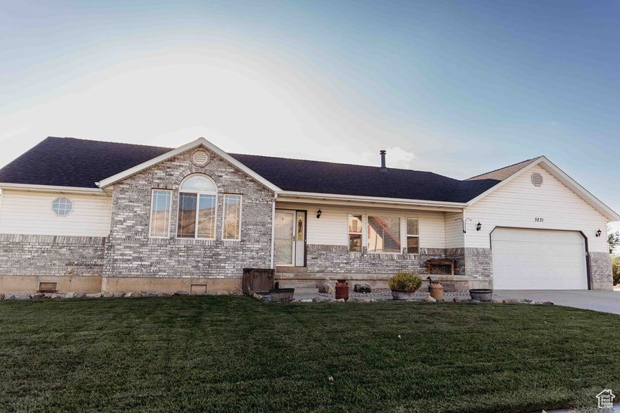 Welcome to your dream home with breathtaking mountain views! This spacious 1,950sf property features 4 beds & 2 baths, nestled on a full acre of land, perfect for a horse property or simply enjoying wide open space. The large, level, fully fenced lot includes multiple outbuildings, RV parking & 2 car garage. Inside, you'll love the open layout with vaulted ceilings, a cozy wood stove & beautiful LVP flooring throughout. The home is full of charm & character, with plenty of storage & room to entertain both indoors & out. Conveniently located near top-rated schools, parks, shopping, restaurants, freeway access & all the incredible outdoor recreation Utah has to offer, including trails, reservoirs, ski resorts & more! This one checks all the boxes, don't miss out! Come check this gem out!