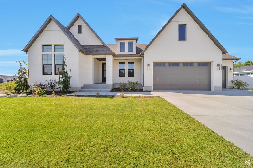 Stunning West Kaysville Home with Open Floor Plan on .42 Acres Welcome to your dream home in highly sought-after West Kaysville! This beautifully upgraded residence sits on a generous .42-acre lot and showcases a striking "European Romantic" exterior that sets the tone for the quality and elegance found throughout. Inside, you'll be greeted by an open floor plan with quality wood flooring, extra-high ceilings, and a soaring 12' ceiling in the family room-perfect for both everyday living and entertaining. The chef's kitchen is a true highlight, featuring top-of-the-line appliances including a 48" dual fuel gas range, built-in side-by-side fridge & freezer, and an expansive dining nook ideal for gatherings. The spacious primary suite boasts a tray ceiling with crown molding, a luxurious en-suite bathroom, and a custom walk-in closet. A second bedroom on the main level also offers a vaulted ceiling and its own en-suite bathroom, making it ideal for guests or multigenerational living. Downstairs, the finished walk-out basement is an entertainer's paradise with a gorgeous wet bar, and plenty of room to relax or host. You'll also find ample storage space throughout the home. Additional highlights include a large laundry room with built-in cabinetry, a 3+ car garage with an impressive 43' deep third stall, and a spacious covered deck perfect for outdoor living. Fully landscaped with a sport court and gas fire pit in the backyard. This home is a true blend of luxury, comfort, and thoughtful design-don't miss your chance to own this West Kaysville gem!