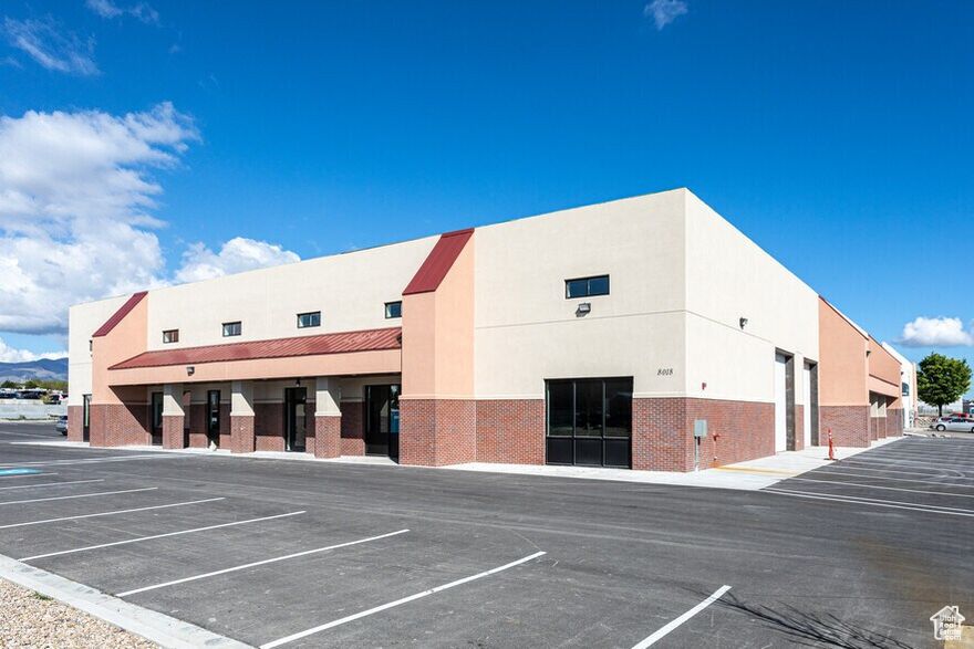 Size: 5,720 Sq. Ft. (4,000 Sq. Ft. Warehouse, 1,000 Sq. Ft. Office/Showroom). 720 Sq. Ft Upstairs Office. Additional 600 Sq. Ft. Mezzanine Storage Not Included In Square Footage. 22' Clear Height. Automatic 10'x14' GL Door. Radiant Heating In Warehouse.  Year Built: 2021. HOA Dues: $296 Per Month. Zoning: MP (Manufacturing Park)