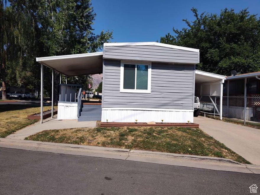Price Improvement!! Seller financing available!!  This updated 2-bedroom, 2-bathroom home on a corner lot is in a great neighborhood and has lots of recent improvements. The kitchen and bathrooms have been remodeled, and new lights have been added throughout. It also has a new water heater and updated windows. The roof was resealed just 6 months ago, and the living room has an evaporative cooler to keep you cool. Plus, there's plenty of storage in the back and a 3-car carport for parking.  The entire corner lot is perfect for get-togethers and family visiting. It's a comfy, move-in-ready home with everything you need!  Buyer is advised to obtain an independent measurement.