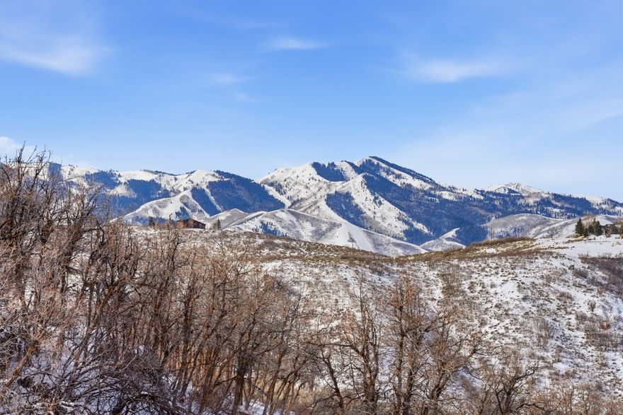 Beautiful Promontory Homesite with Privacy, Mountain Views & Stunning Sunsets -- Great homesite nestled in Promontory's Northgate Canyon neighborhood, offering stunning western exposure with ski mountain top views and the dramatic cliffs of the canyon as your backdrop. This easy-build lot comes with thoughtfully designed house plans that were previously approved, requiring only a simple resubmittal-making it an ideal opportunity for a buyer ready to begin building in the near future. Located just minutes from historic Main Street in Park City, Promontory Club spans over 7,200 acres and offers an unmatched four-season mountain club lifestyle for all ages. Members enjoy access to 18 completed amenity venues, including private ski lodges at Park City Mountain Resort and Deer Valley Resort, along with golf, dining, fitness, trails, and year-round recreation for the entire family.