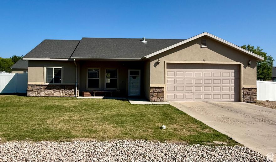 Welcome to this well-kept 3-bedroom, 2-bath home on a spacious .31-acre lot in Vernal! Built in 2007, this single-level residence offers easy living with an open layout, a 2-car garage, and a fully fenced backyard-perfect for outdoor enjoyment, pets, or gardening. With its comfortable design and convenient location, this home is ready for you to move in and make it your own.