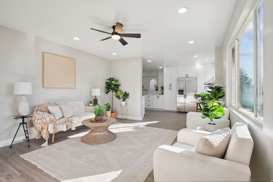 Fantastic remodel top to bottom! Quiet street within walking distance to West Kearns Elementary.  1 car attached garage steps into the mudroom and laundry, through the door leads into a beautiful new kitchen with all new stainless steel appliances, custom cabinets with quartz countertops and a lovely backsplash. Stylish flooring and fixtures throughout. Large backyard for the whole family to enjoy and big shed.  Square footage figures are provided as a courtesy estimate only and were obtained from county records.  Buyer is advised to obtain an independent measurement.