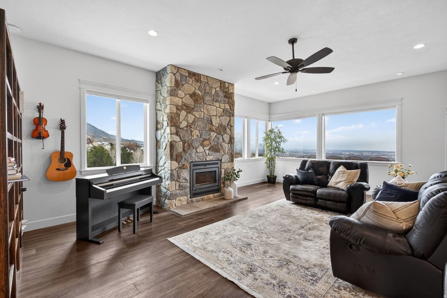 MOTIVATED SELLERS!  Come and see this 1.36-Acre Private Sanctuary: The Ultimate Smart-Estate on the Pleasant Grove Bench.  Discover the pinnacle of luxury rightsizing on 1.36 acres of private bench land. Bordering protected mountain territory, this 2019 custom-built sanctuary offers an unparalleled lifestyle for the discerning buyer who values privacy, technology, and the outdoors.  Designed with a sophisticated 'empty-nester' focus, the home prioritizes vast, open-concept living over redundant hallways. The main level is a masterclass in intimacy and scale, featuring a secluded Primary Wing and a $25,000 Lutron Caseta automated lighting system throughout. The 'Earth Climate Battery' greenhouse provides a year-round tropical oasis, while the 1,000 sq. ft. heated workshop garage offers space for two cars plus a full side-by-side bay and workshop.  Outside, the estate transforms into a private park. Experience your own personal mountain retreat with custom boulder trails leading to a secluded hillside viewing bench-the perfect spot for dual-valley sunsets over Utah Lake and parts of the Salt Lake Valley. The upper pad features an irrigated stadium space (prepped and ready for turf, grass or pavillion), a 150-ft commercial-grade zipline, and full electrical hookups. With direct trailhead access to Valley Vista and foothill trails, this is more than a home; it's a 1.36-acre adventure estate designed for those who have outgrown the subdivision but never the view.Square footage figures are provided as a courtesy estimate only and were obtained from tax data. Property sold along with parcel # 14-010-0050. Buyer is advised to obtain an independent measurement.