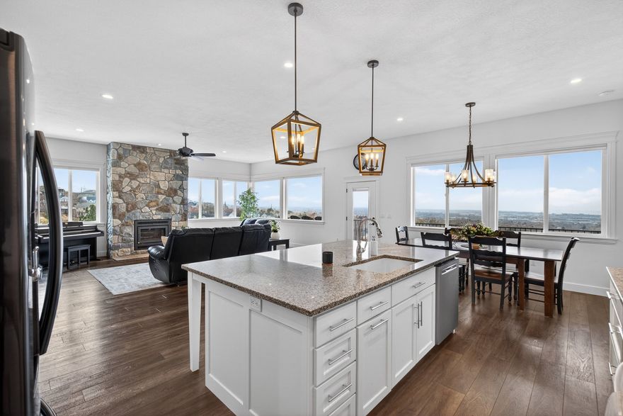 MOTIVATED SELLERS!  Come and see this 1.36-Acre Private Sanctuary: The Ultimate Smart-Estate on the Pleasant Grove Bench.  Discover the pinnacle of luxury rightsizing on 1.36 acres of private bench land. Bordering protected mountain territory, this 2019 custom-built sanctuary offers an unparalleled lifestyle for the discerning buyer who values privacy, technology, and the outdoors.  Designed with a sophisticated 'empty-nester' focus, the home prioritizes vast, open-concept living over redundant hallways. The main level is a masterclass in intimacy and scale, featuring a secluded Primary Wing and a $25,000 Lutron Caseta automated lighting system throughout. The 'Earth Climate Battery' greenhouse provides a year-round tropical oasis, while the 1,000 sq. ft. heated workshop garage offers space for two cars plus a full side-by-side bay and workshop.  Outside, the estate transforms into a private park. Experience your own personal mountain retreat with custom boulder trails leading to a secluded hillside viewing bench-the perfect spot for dual-valley sunsets over Utah Lake and parts of the Salt Lake Valley. The upper pad features an irrigated stadium space (prepped and ready for turf, grass or pavillion), a 150-ft commercial-grade zipline, and full electrical hookups. With direct trailhead access to Valley Vista and foothill trails, this is more than a home; it's a 1.36-acre adventure estate designed for those who have outgrown the subdivision but never the view.Square footage figures are provided as a courtesy estimate only and were obtained from tax data. Property sold along with parcel # 14-010-0050. Buyer is advised to obtain an independent measurement.