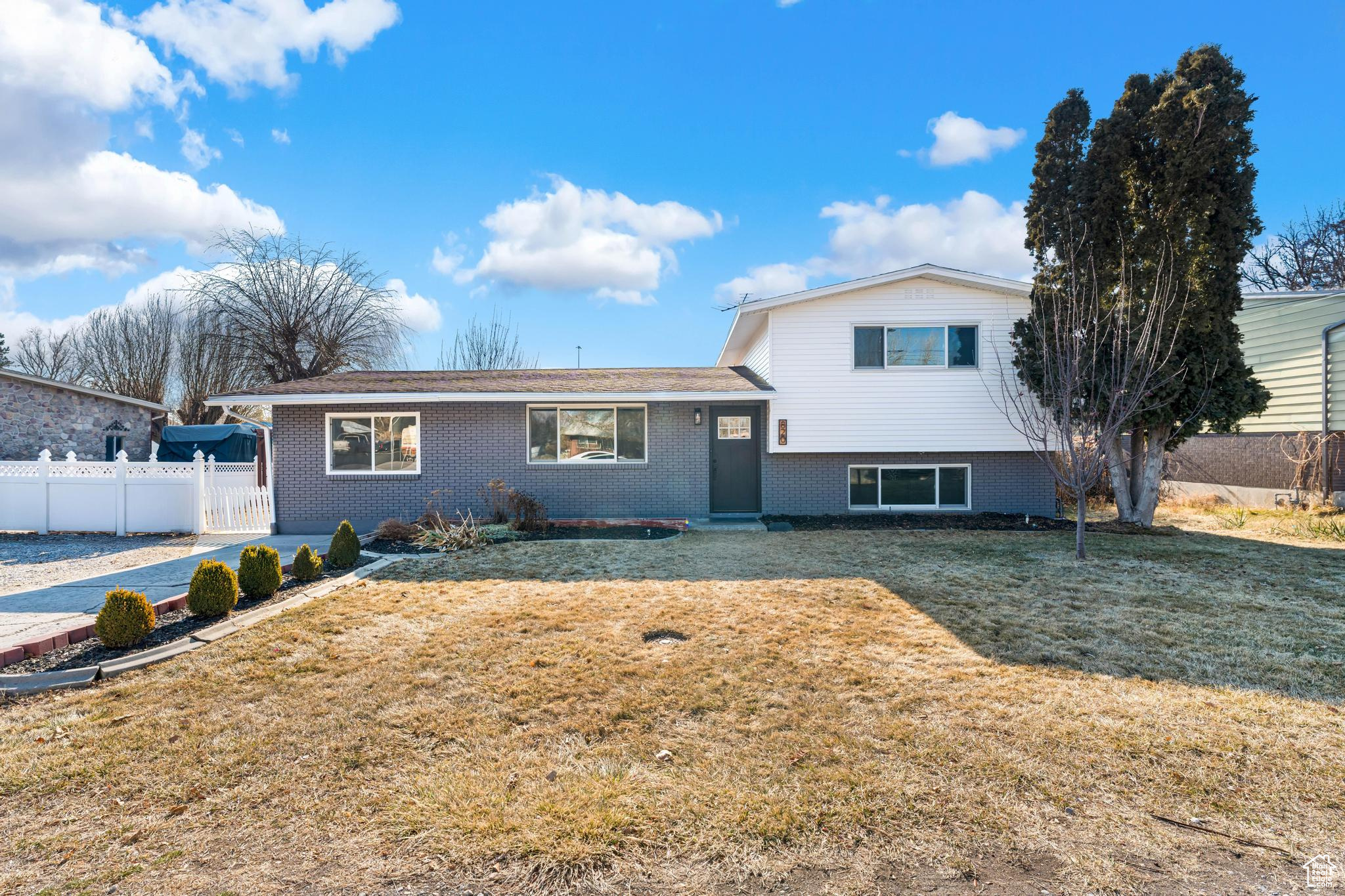 Stunning remodel in the heart of Lehi! This affordable home is beautifully remodeled with quartz counters, new kitchen and bath, with new gorgeous flooring throughout. Enjoy the large front and back yard, ready to make your own. This home has quick access to the freeway as well as all the shopping you could want. The basement can be used either as a master suite, or an open family room with a sliding barn door for privacy. Schedule your private showing today!  Square footage figures are provided as a courtesy estimate only and were obtained from county records .  Buyer is advised to obtain an independent measurement.