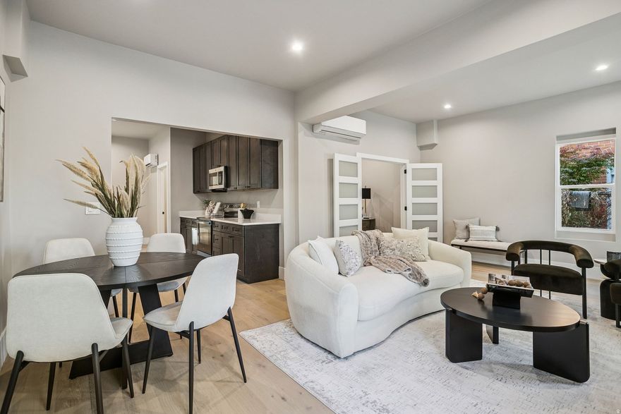 Fully remodeled and not shy about it. This 2 bed, 2 bath home was taken down to the bones and rebuilt with zero shortcuts and no "good enough" moments. The galley kitchen is sleek and efficient, perfect for the cook who knows where everything should be and doesn't need anyone else in their way. The detached garage gives you space to tinker or store the toys, and there's plenty of off street parking for guests who want to see what "fully remodeled" really looks like. You're minutes from downtown, coffee shops, and anything else you might need when you remember you live in one of America's greatest cities. This isn't a flip. It's a comeback story, and it looks good doing it.