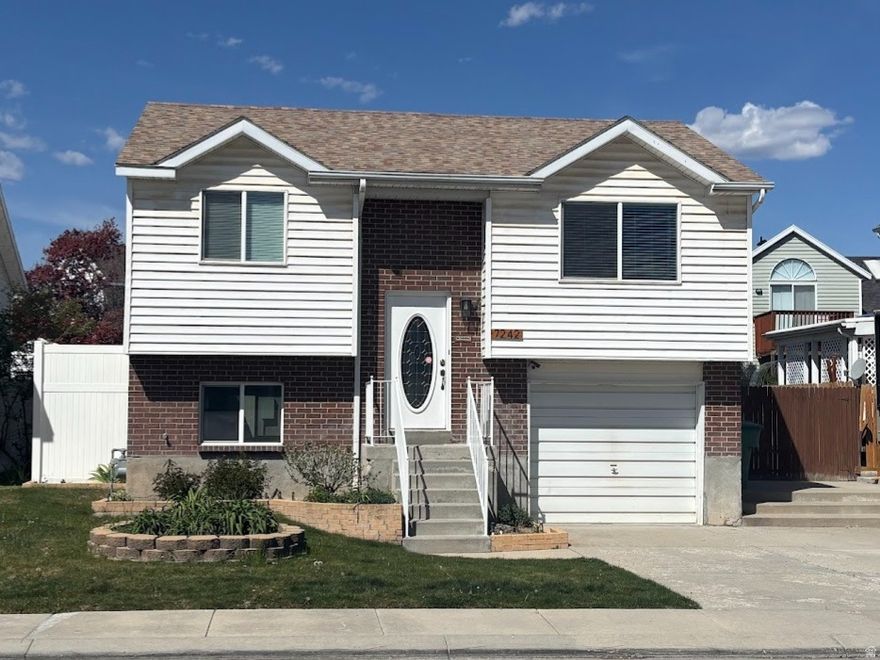 Come look at this welcoming starter home in West Jordan! It's been updated with new paint upstairs and new AC in the last 3 years. It's been professionally cleaned and ready for you to move right in. The kitchen offers a nice sized pantry, and the refrigerator is included. Just off the kitchen, enjoy a deck that opens to the backyard-perfect for relaxing or entertaining. Downstairs, the basement has been used as a hobby room and features plenty of built-in cabinetry. With your vision this space could easily become a family room or even an extra bedroom. Out back you will also love the 12' x 20' workshop, great for projects, hobbies, or extra storage. Plus, the home is conveniently located with quick access to Redwood Road and I-215. Square footage figures are provided as a courtesy estimate only and were obtained from county records. Buyer is advised to obtain an independent measurement.