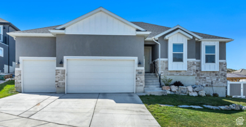 Spacious rambler with ADU that can help offset your mortgage or accommodate a large family. Located in a very quiet neighborhood, this 6-bedroom, 4-bathroom home features a fully finished basement with its own entrance, second kitchen, and separate laundry-perfect for rental income, guests, or multi-generational living. The main level offers 3 bedrooms, 2 bathrooms, open living areas, and a full kitchen with granite countertops and stainless steel appliances. High 9 ft. ceilings on both levels create an expansive feel throughout. The basement includes 3 additional bedrooms, 2 bathrooms, a second kitchen, and its own washer and dryer. A 3-car garage provides ample parking and storage. Both sets of washers and dryers are included. Enjoy a private backyard with a patio-ideal for outdoor gatherings, barbecues, or simply relaxing. The basement is currently rented with tenants willing to stay through the end of their contract, providing immediate income potential. A versatile home with endless possibilities!