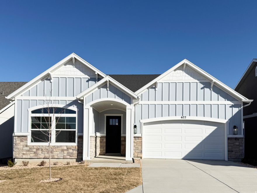 Fully finished rambler with walk-out basement and spectacular unobstructed views! Rare to find a new home in Mapleton with views like this. Located in the very desirable Bella Vita community. All homes are designed with main level living, minimal stairs, and affordable luxury features. This "Bianca" floor plan is a true gem. Everything you need is on the main level: Primary bedroom with luxurious bathroom, Zero entry Euro glass shower, Pass through closet to the large laundry area with sink, Large home office, Secondary bedroom next to a full bath, Voluminous 10' high ceilings, Luxury kitchen with oversized pantry. Charming rock fireplace, views from the large dining area windows , Large deck with views off the family room. And that's just the main level!  Use the main level every day, then enjoy your holiday parties and family gatherings in the huge basement complete with oversized recreation area, 3 additional bedrooms, full bath, covered patio, tall 9' ceilings. From the basement, you can take the party to the new community pool, or enjoy dessert under the gazebo. Since Bella Vita is a fully maintained community, you can throw away the lawn mover and snow blower. Located on a quite cul-de-sac for maximum privacy. Spend your time enjoying the "Beautiful Life" at Bella Vita!