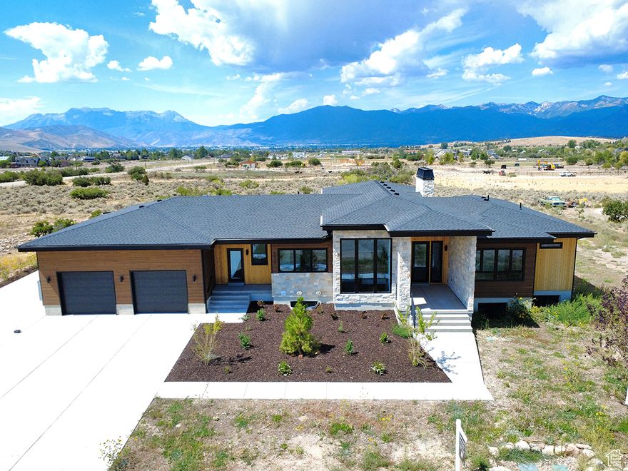 Nestled on the east side of Heber Valley, this stunning new construction project was designed and built by the builder for personal use, which means it boasts a range of high-end upgrades. Features include European windows, solid walnut doors, Thermador appliances, walnut cabinetry, and beautiful cross-cut oak floors, ensuring every detail has been thoughtfully considered. The home has also been hermetically sealed for enhanced efficiency. Spanning 1.23 acres, the yard offers breathtaking unobstructed views of Mt. Timpanogos, with ample space for the addition of a pool, outbuilding, or even horses, making it a wonderful retreat for equestrian enthusiasts. It strikes a perfect balance of privacy and accessibility to nearby amenities. The home is easy to show-please call to schedule an appointment.