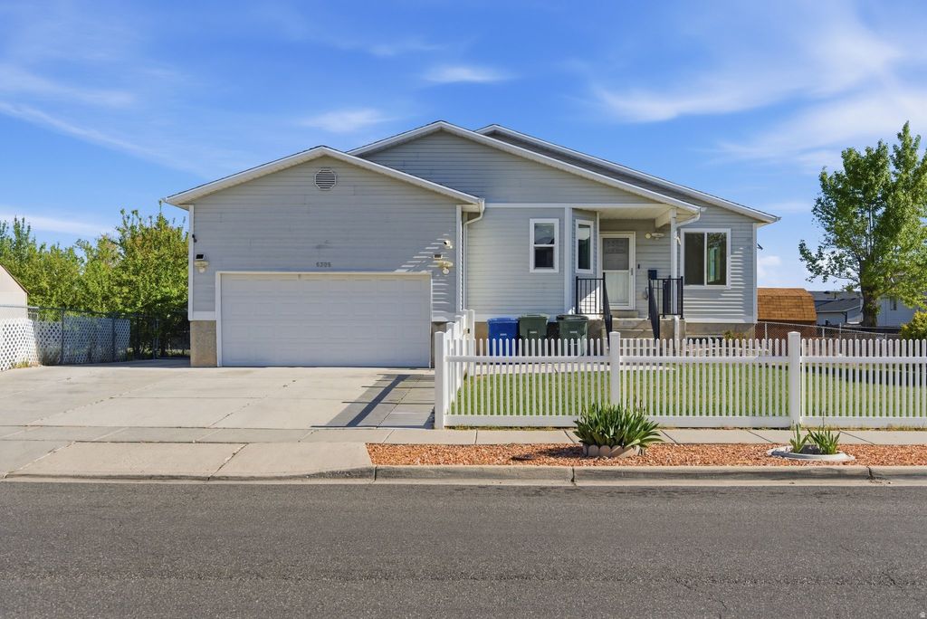 Photo of 6306 W MARCREST DR, West Valley City, UT 84128 (MLS # 2150852)