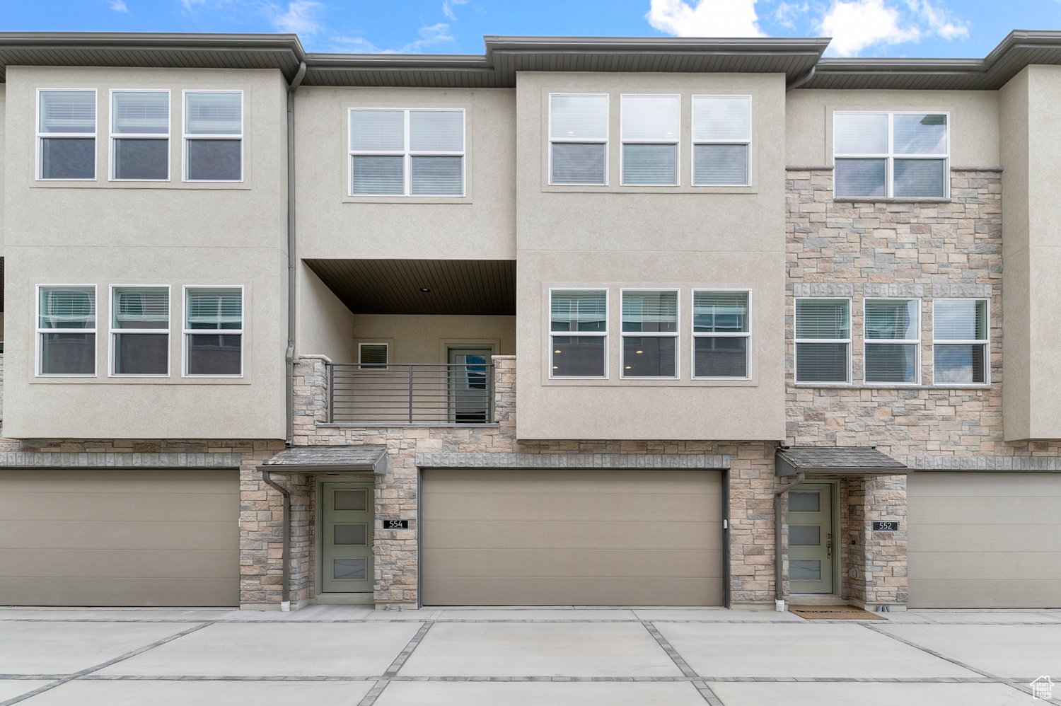 Step into this beautiful Aspen, a thoughtfully designed town home that combines modern efficiency with timeless style. The kitchen showcases gray laminate cabinets, quartz countertops, and stainless steel gas appliances, creating a space that is both functional and beautiful-perfect for everyday living and entertaining. Throughout the home, you'll find a blend of laminate hardwood, vinyl tile, and plush carpet flooring, providing durability and comfort in every space. Craftsman-style base and casing add a touch of character and charm, enhancing the home's warm and welcoming design. The owner's bathroom is a private retreat, featuring cultured marble shower surrounds paired with elegant satin and brushed nickel hardware for a clean, polished finish. Built with today's homeowner in mind, the Aspen includes a tankless water heater for endless hot water and energy-efficient options designed to reduce utility costs while keeping your home comfortable year-round. With its balance of style, function, and efficiency, this home offers everything you need to create the perfect home for your lifestyle.