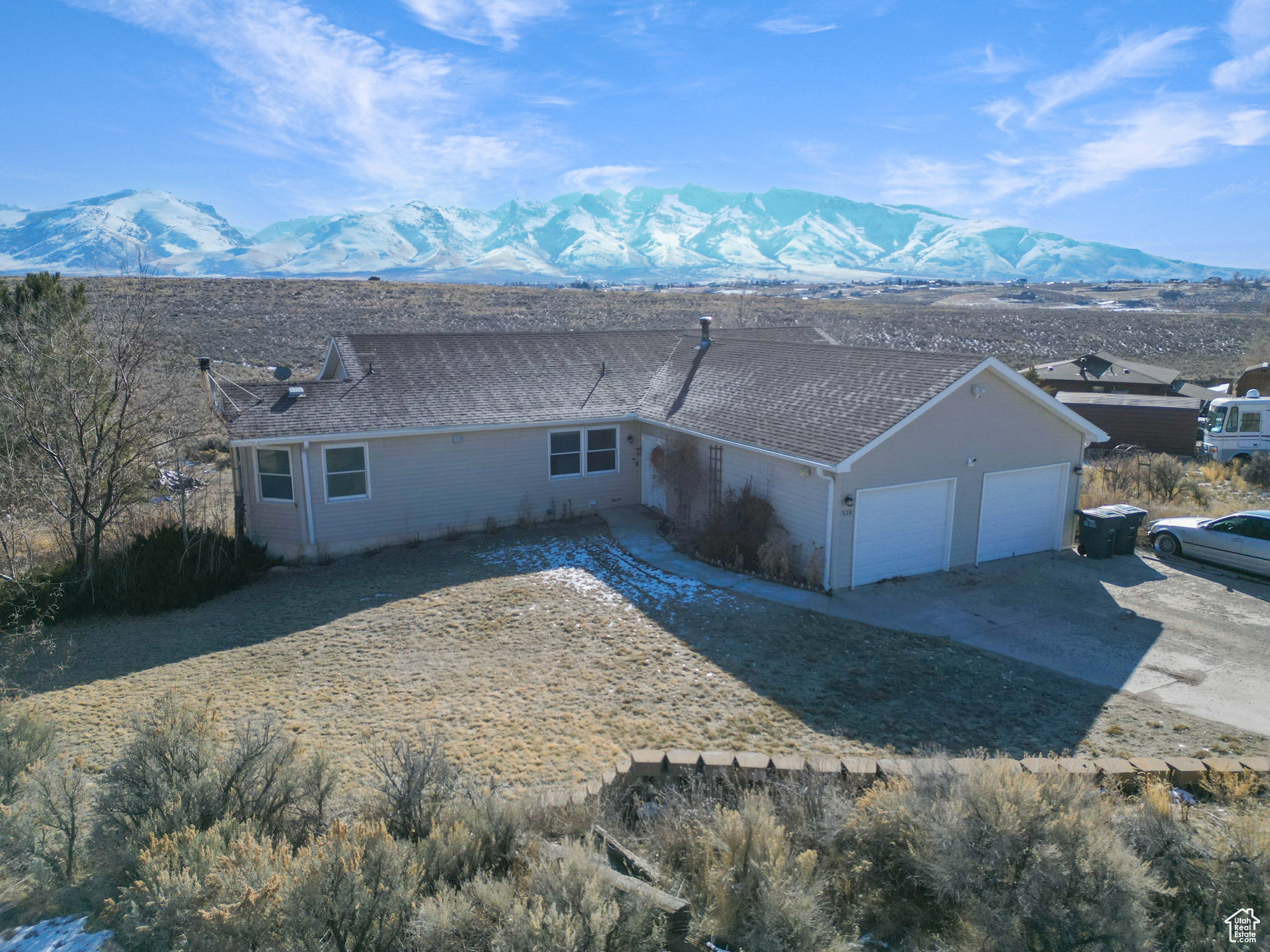 This five bedroom, three bathroom home sits on two beautiful acres with incredible views of the Ruby Mountains. Inside, you'll find two living areas, an inviting ktichen with double ovens making it perfect for hosting and family gatherings.The home is heated with a reliable diesel furnace, ensuring warmth during the colder months. The backyard is private and peaceful, backing up to undeveloped land with no neighbors behind you. Whether you're relaxing on the covered patio or taking in the mountain scenery, this property offers a quiet escape with room to enjoy the outdoors.A great opportunity for anyone looking for a spacious home in a beautiful setting!