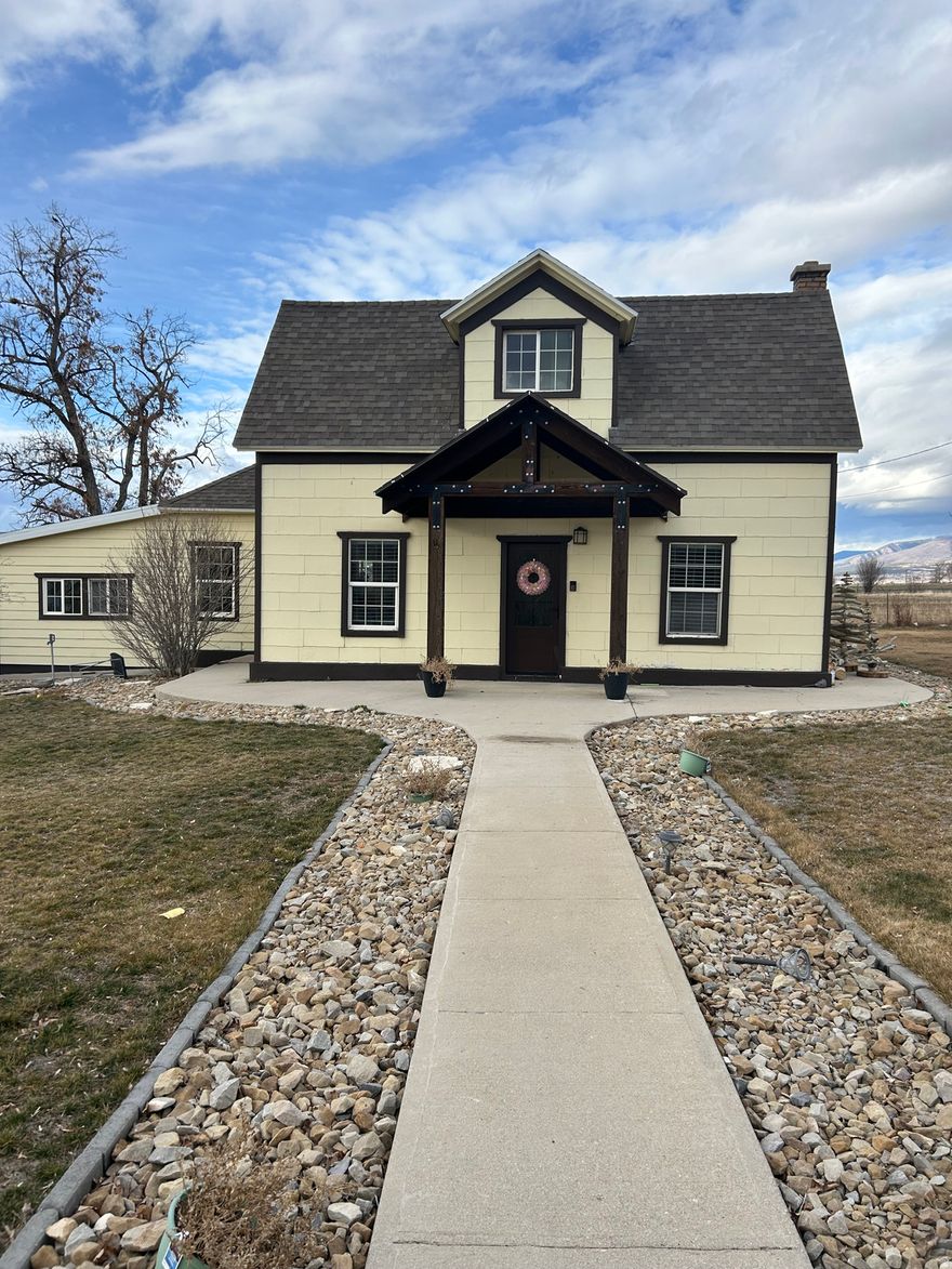 Beautiful country home featuring numerous upgrades and thoughtful details throughout. The well-maintained interior includes 3 bedrooms and 2 bathrooms, a spacious family room, and a functional mudroom. Recent improvements include an updated furnace, air conditioning unit, and water heater. Situated on a large lot, the property offers ample space for recreational vehicles and equipment. The detached garage provides additional room for a workspace and a small storage area, making this home both comfortable and practical.  Square footage figures are provided as a courtesy estimate only and were obtained from a previous appraisal.  Buyer is advised to obtain an independent measurement.