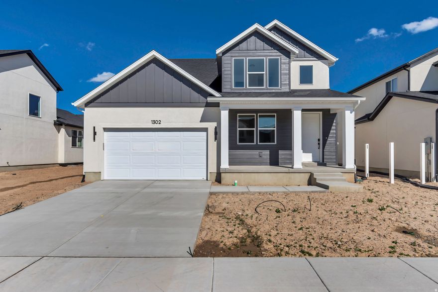 Move-in ready and designed for easy, modern living! This home features high-end finishes, a main-level primary bedroom, and an open-concept layout that's perfect for everyday living and entertaining. Located in scenic Payson, you'll enjoy beautiful views all around. The McCormack Plan includes a spacious kitchen with a large pantry, plus two upstairs bedrooms and a versatile catwalk overlooking the great room. There is also another bedroom/flex space on the main level. The unfinished basement provides room to grow or additional storage!