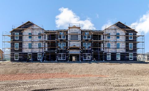 Photo of 12719 S WATERPOCKET LN #A201, Herriman, UT 84096 (MLS # 2130645)