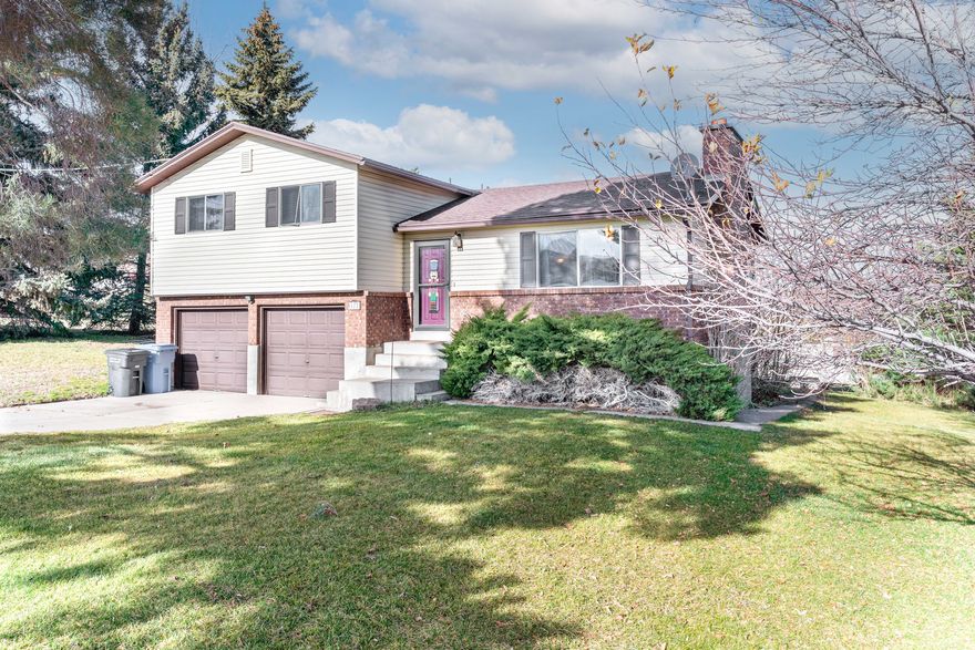 Charming Country Home for Sale Cozy Living in a Peaceful Small-Town Setting Welcome to a comfortable home in a quiet country town, offering simple living with beautiful mountain and valley views, plus animal rights. This property provides plenty of space to make your own while maintaining a warm, lived-in feel. Key Features Bedrooms: 4 total (3 upstairs, 1 downstairs) Bathrooms: 1 full bathroom, plus another bathroom that is unfinished Living Space: Warm and inviting living and dining areas with good natural light Kitchen: Refrigerator, stove, and dishwasher included; dining area features a unique multicolor stained wood wall Outdoor Space: Large backyard with a deck-great for relaxing or enjoying the open space Parking: Attached two-car garage with extra driveway parking Basement: Unfinished bathroom, laundry room, and family room give you room to add your own touches Flooring: Wood-grain laminate in the kitchen, halls, bedrooms, and entryway Location Highlights Quiet, family-friendly street Peaceful country setting Why You'll Love This Home This home offers a comfortable layout and plenty of room to personalize. If you're looking for quiet living, open space, and a home you can make your own, this property is a great fit. Square footage figures are provided as a courtesy estimate only and were obtained from appraisal  .  Buyer is advised to obtain an independent measurement.