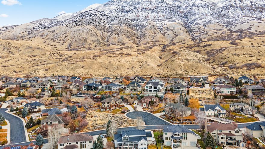 This .3 acre lot is located in an established neighborhood with no HOA. Views of lake and Mountains from this cul-de-sac, corner lot.  5 minutes to American Fork Canyon, and close to Manilla Pond. Just up from Murdock Canal Trail entrance and close to access to Bonneville Shoreline Trail. Alpine School District.