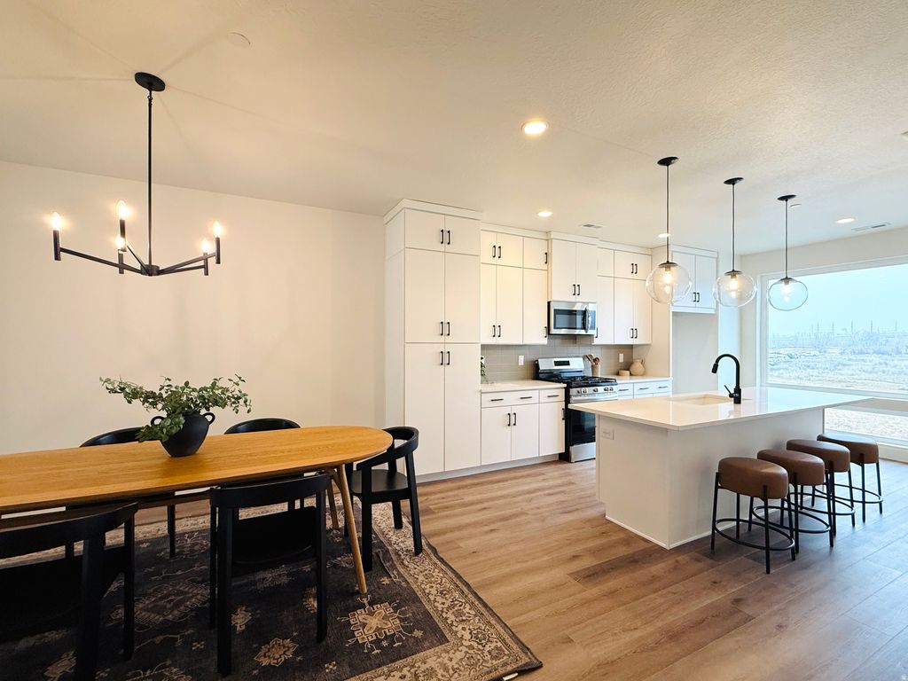 Photo of 1485 W BURKE LN #102, Farmington, UT 84025 (MLS # 2123747)