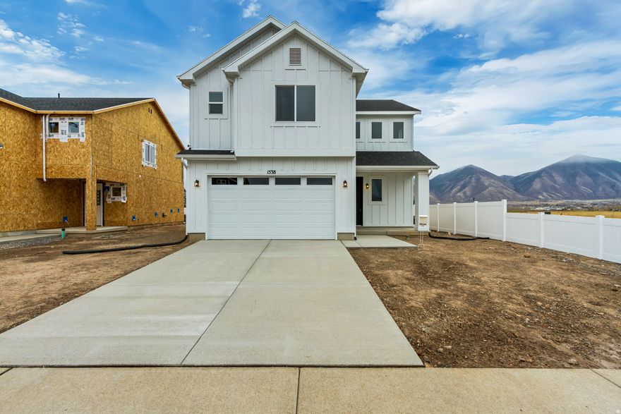 Come see this beautiful Gambel Oak home in Harmony Place in Salem. This home is finished andready to move in. Designed to impress, it features soaring open-to-below ceilings in both the entry and family room, gorgeous finishes throughout.