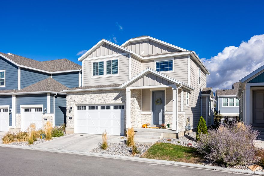 PREFERRED LENDER INCENTIVE OF 1% TOWARD CLOSING COSTS OR RATE BUY-DOWN - Seller is a licensed general contractor and will finish the basement for cost. Love the feeling of a brand-new home but don't want to wait for construction? This nearly new 4-bedroom, 2.5-bath home in Highland is ready for you now. Built in 2023 and located in one of North Utah County's fastest-growing areas, this home blends modern comfort, thoughtful design, and everyday convenience. With the builder, Ivory Homes, soon releasing the next phase starting in the mid-$700s, this home represents an incredible opportunity to own in the community before prices jump.  Enjoy easy access to parks, trails, and pickleball courts just steps away, or head minutes east to American Fork Canyon for hiking and mountain views. You'll also be close to Silicon Slopes, as well as shopping, dining, and top-rated schools.  Inside, you'll find a bright, open-concept main level designed for modern living. The kitchen, dining, and living spaces flow seamlessly together, featuring quartz countertops, luxury vinyl plank flooring, and timeless finishes. The spacious primary suite is conveniently located on the main floor with its own walk-in closet, private bath, and in-suite laundry.  Upstairs, three large bedrooms, each with walk-in closets, share a full bath and a second laundry room for added convenience. The unfinished basement offers room to grow, perfect for a future gym, media room, or extra bedrooms.  Outside, the 10'x30' paver patio and private fenced yard set the stage for weekend BBQs and evenings under the stars. The epoxied garage adds a touch of polish and practicality. The HOA manages the landscaping so you will have more time to focus on what really matters to you.  If you've been searching for a move-in-ready home in a community that's growing fast and has all the perks of new construction, this Highland property is the one to see. Optional finished basement!