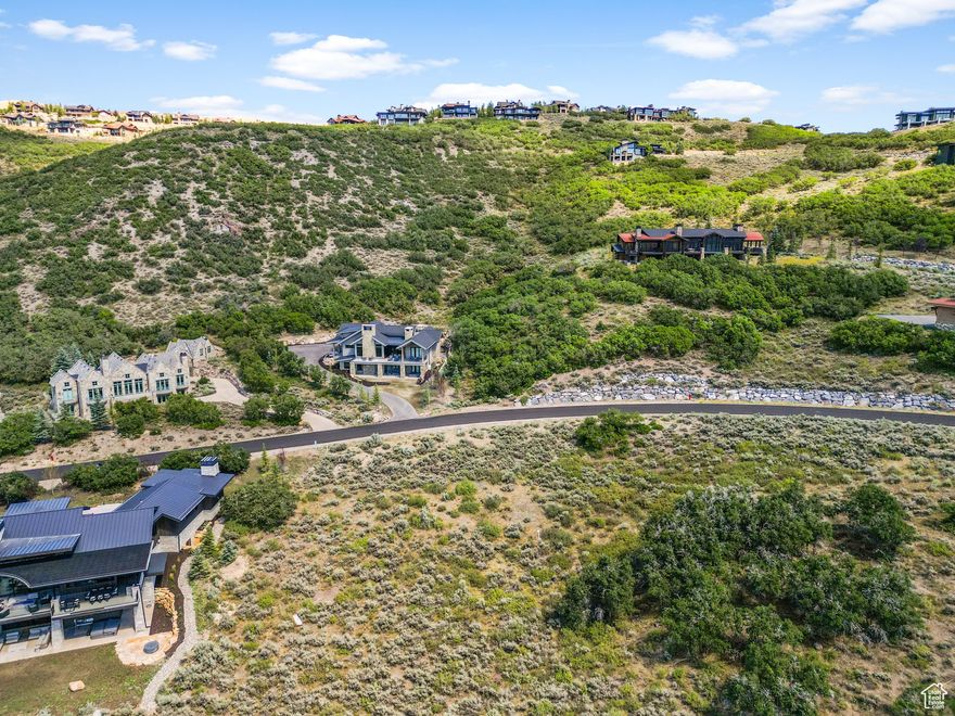 Nestled within easy reach of Promontory's northern gateway and I-80, this exceptional 1.07-acre homesite beckons for the creation of your dream residence. Minutes from the heart of downtown Park City, Promontory sprawls over 6,400 acres, delivering an incomparable, all-encompassing mountain club experience across all four seasons for individuals of every age. The allure of this location extends further with close proximity to three world-class ski resorts, and with the anticipated completion of Deer Valley East Village, the count rises to an impressive four resorts. Enriching this remarkable setting are Promontory's exclusive amenities, seamlessly blending outdoor adventure with luxurious leisure. Imagine days filled with championship golf rounds, horseback riding along scenic trails, and unwinding at the spa, all within this prestigious mountain community. As you envision building your dream home on this expansive lot, consider the unparalleled access to a private equestrian center, hiking and biking trails, and multiple clubhouses featuring fine dining and social events. Your architectural masterpiece will find its place amidst the breathtaking landscape and the array of Promontory amenities, where common area perks complement the surrounding natural beauty. This is not just a home; it's an invitation to a lifestyle where mountain tranquility meets the pinnacle of refined living. Explore the seamless blend of exclusive amenities and proximity to world-renowned ski destinations that define this extraordinary opportunity.