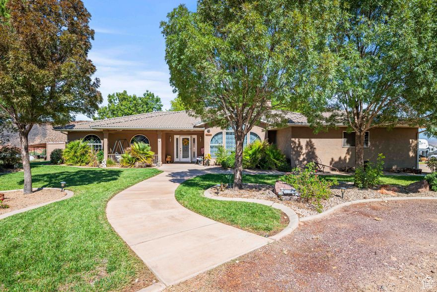 Stunning Ranch-Style Home on 1.66 Acres with Premium Upgrades and Horse-Friendly Features! This spacious 2676 sq. ft. home offers 3 bedrooms, an office (possible 4th Bedroom), and a bright open floor plan with many upgraded finishes. The family room includes a charming woodburning stove for added comfort & ambiance. A craft room off the 3-car garage adds flexibility, and the covered patio features 3 ceiling fans, lighting, and a misting system for comfort. The 1.66-acre lot is home to peach, pear, apple, fig, and pomegranate trees. Zoned Residential-Agricultural (1 Acre), it's ideal for horses & includes covered horse stalls (corral panels are not included). Perfect for enjoying the best of country living while staying close to city amenities. A must-see property-schedule a tour today!
