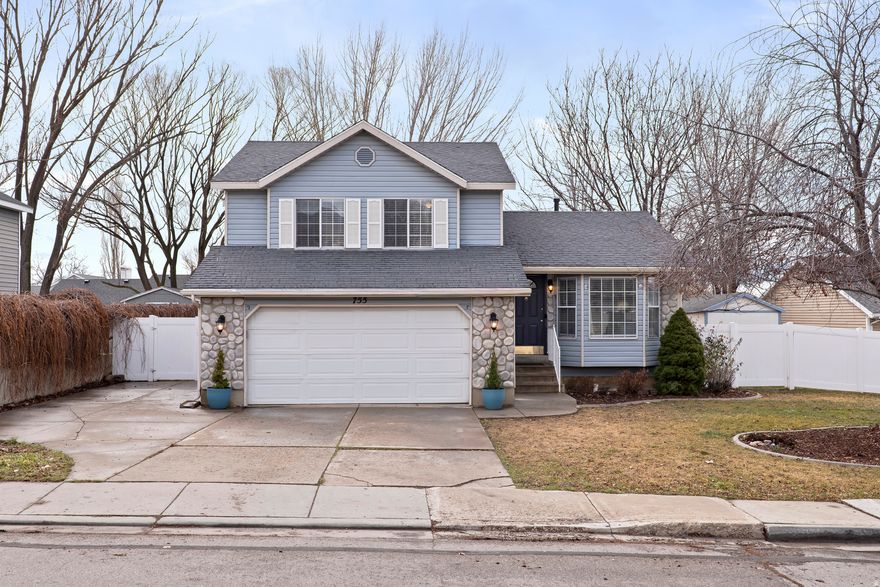 Welcome to this beautiful 4-bedroom, 3-bath home in a peaceful east Lehi community - perfectly designed for a growing family who needs space, flexibility, and a yard that truly gets used. You'll enjoy the open, light-filled floor plan - where the spacious living areas flow effortlessly from the vaulted living room, to kitchen, to family room.  Upstairs you'll love the three bedrooms, including a spacious primary suite with separate shower and tub; and downstairs offers another private suite- ideal for guests, in-laws, or a future teen retreat - plus a dedicated home office, giving you a quiet workspace. The fully fenced backyard is perfect for entertaining, gardening and outdoor play. And parking will never be a problem with the deep two-car garage, plus a bonus third driveway providing space for an RV, bikes or extra vehicle.  Located on a quiet street with quick access to I-15, schools, parks, medical care, shopping and the Lehi Rail Trail, this lovely home has it all.  Call to schedule your personal tour of this Lehi gem today.  *Square footage taken from County records; buyer advised to verify.