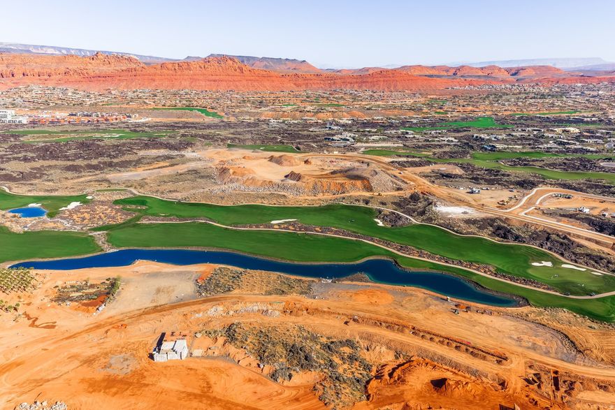 A rare opportunity for the true golf purist, this exceptional 0.72-acre pondside homesite is perfectly positioned along the water on the 13th hole on a flat lot. Enjoy front-row views of championship play on Tom Weiskopf's 73rd and final course design-an award-winning layout, host of the PGA Tour's Bank of Utah Championship, and already ranked among the nation's premier modern courses.  One of only six pondside fairway homesites in Silver Reef, this coveted offering combines intimate proximity to the course with the serenity of water frontage, expansive green fairway views, and striking red rock scenery rising in the distance-all with a touch of privacy. Ownership includes Black Desert Club membership with no initiation fee, preferred tee times, and full access to resort amenities including seven dining venues, luxury spa, Championship Pickleball facility and event arena and now under construction, a 5-acre Waterpark with something for all ages, including private adult only areas.  Set within Southern Utah's iconic red rock landscape and just under an hour from Zion National Park, and minutes from Snow Canyon State Park, this homesite offers an accelerated path to refined desert living. Trophy golf properties of this caliber are exceedingly rare.