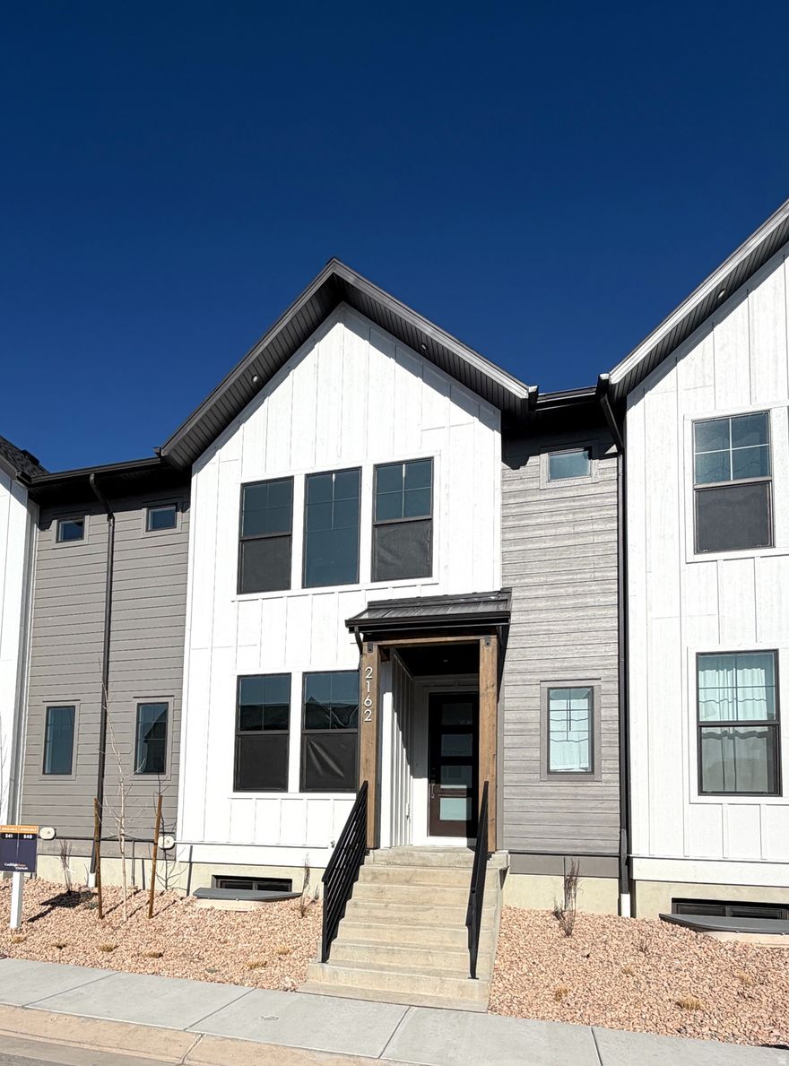 The Cottonwood townhome includes three bedrooms, two bathrooms, and a spacious main living area. The main floor features a living room, dining area, and kitchen with an island, plus access to the garage. Upstairs are three bedrooms, including a master with an attached bath and closet, a second full bathroom, and a laundry closet for a full-size washer and dryer. Amenities include: Lighted Basketball and Pickleball Courts, An Artificial turf multi-sport field, including soccer, lacrosse, football, and a full-time Activities Director